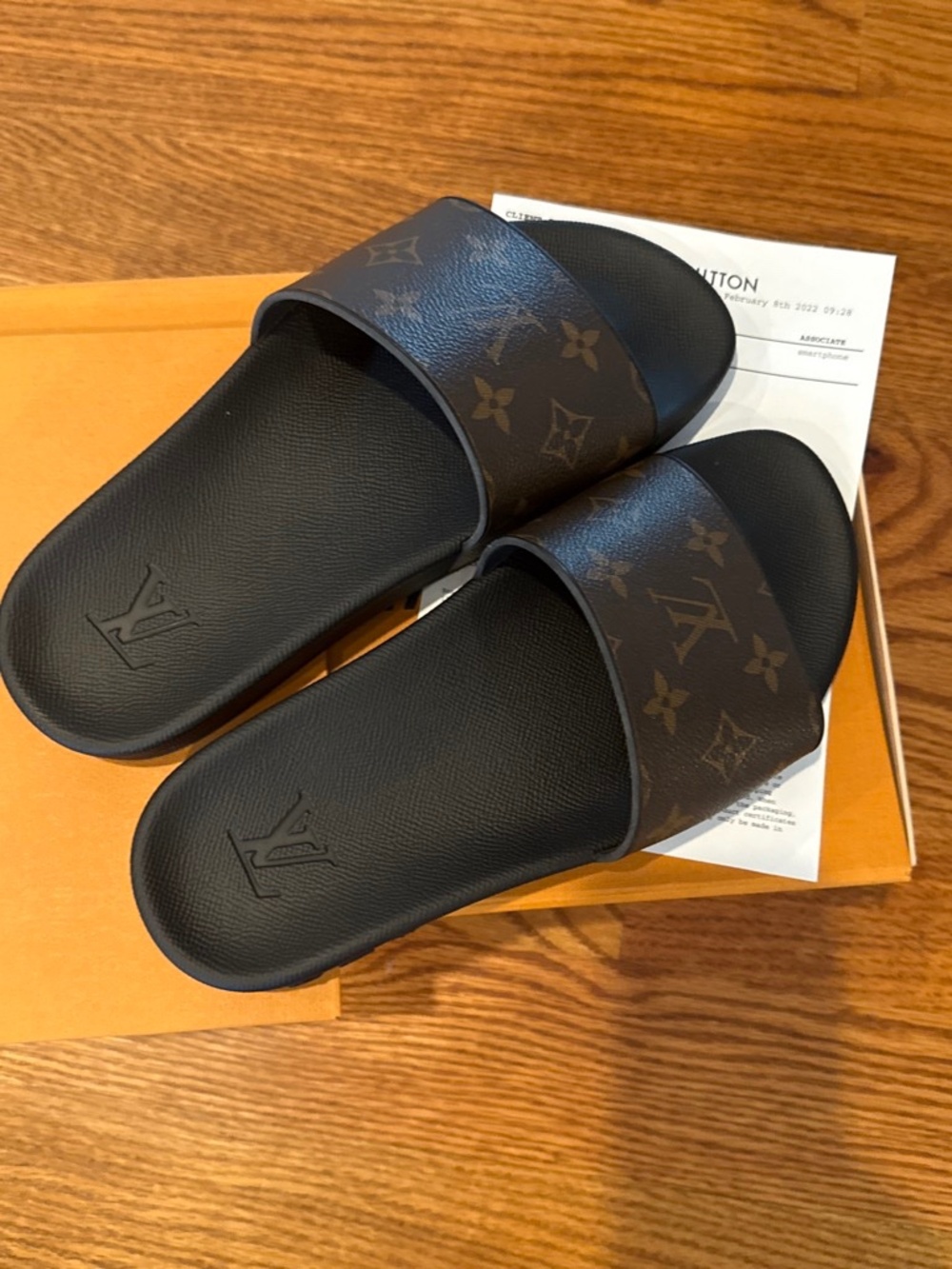 Louis Vuitton men’s size 6 water slides